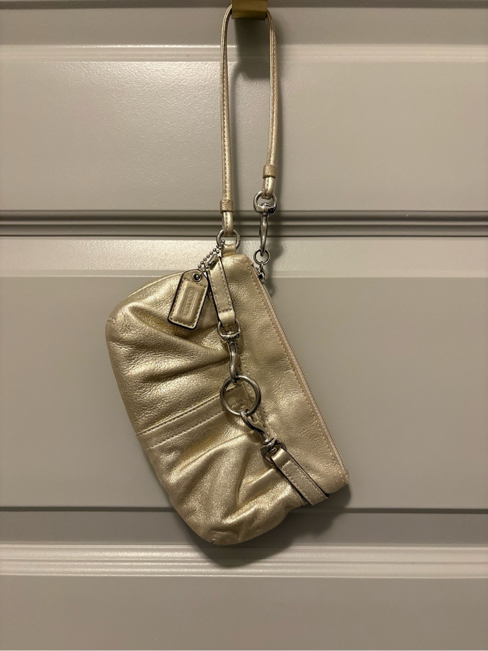 Coach Soho Buckle Y2K Gold Wristlet
